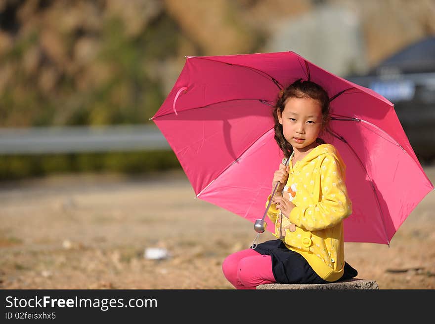 Asian girl and Umbrella outdoor.