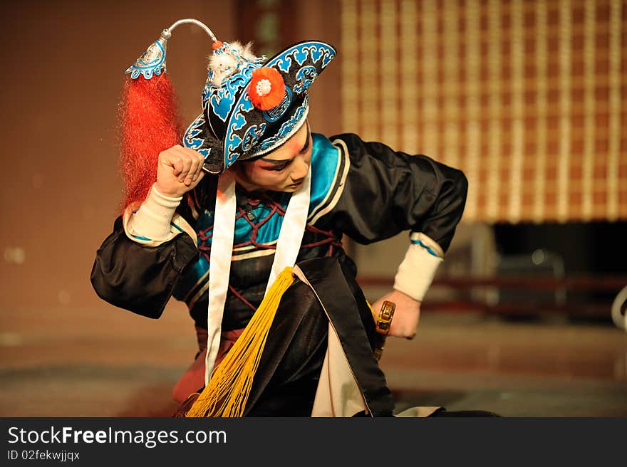 China opera actor with hat