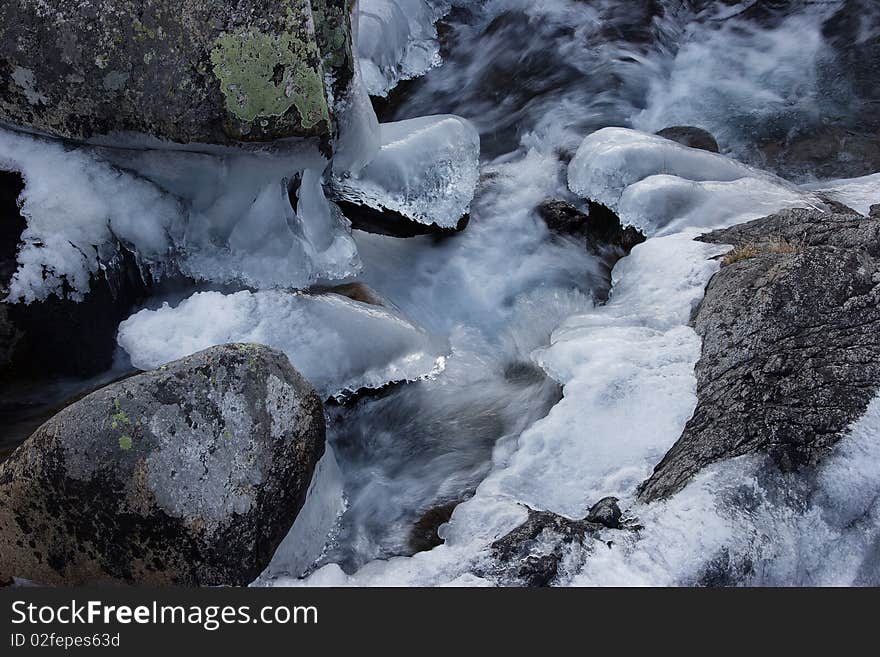 River flowed rapidly inside the rock. River flowed rapidly inside the rock