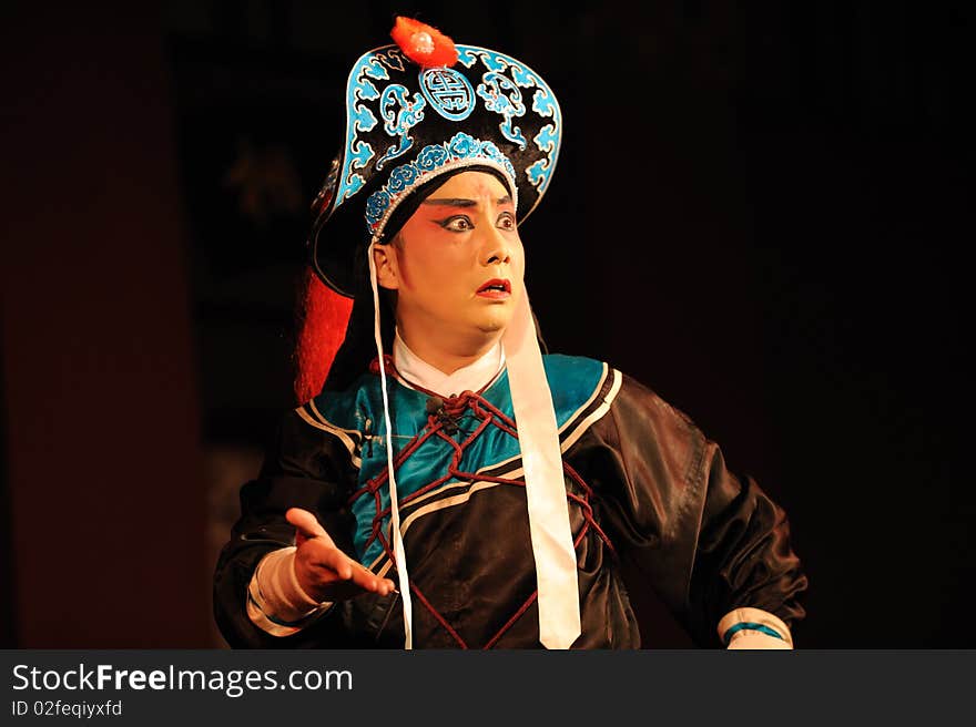 China opera actor with hat