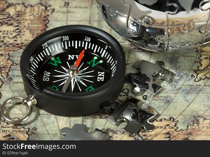 Compass on the old map. Concept travel.