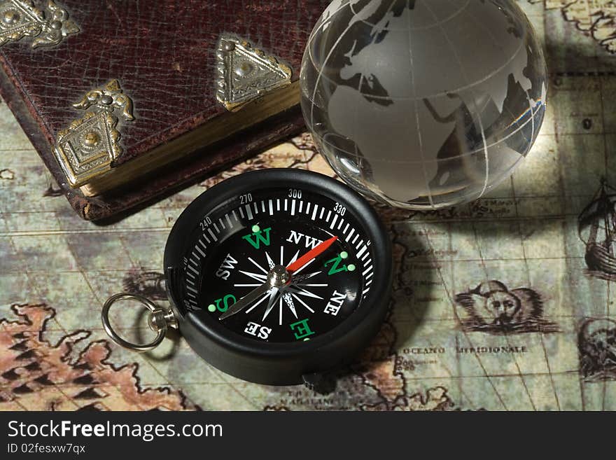 Compass on the old map