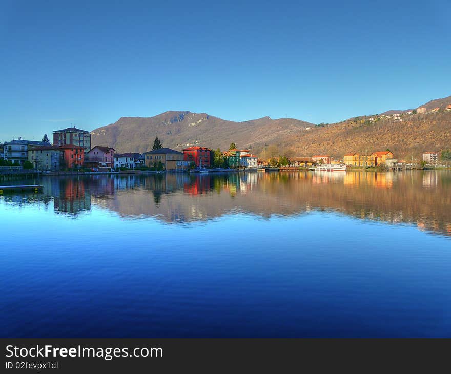 Reflection of a village on the lake