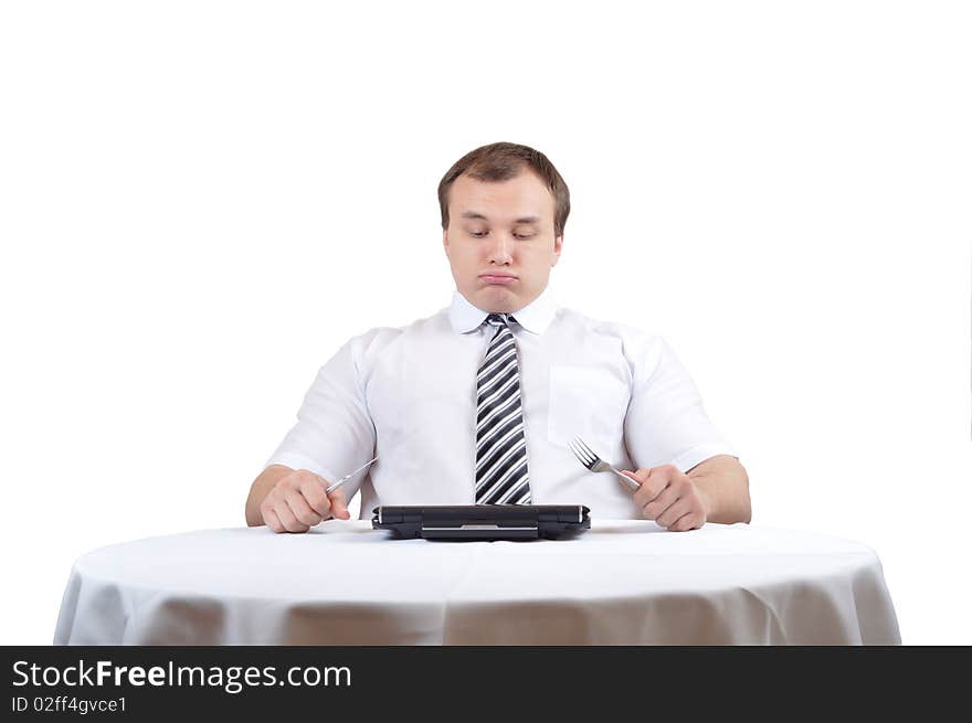 Businessman is blowing after lunch over table with notebook. Businessman is blowing after lunch over table with notebook