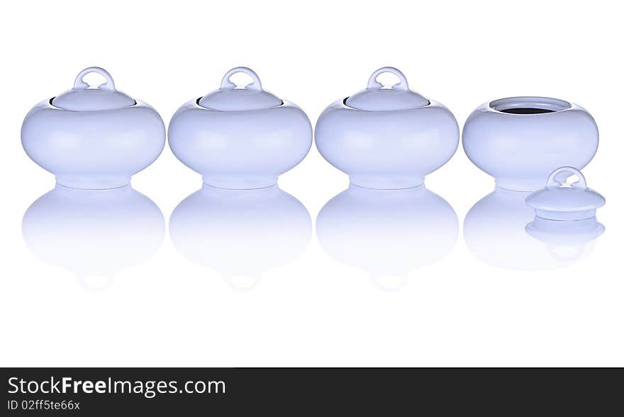 Blue Sugar Bowls In A Row With Top Off