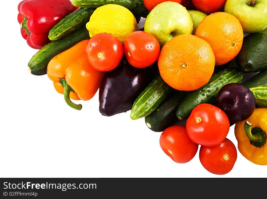 Vegetables and fruits on white