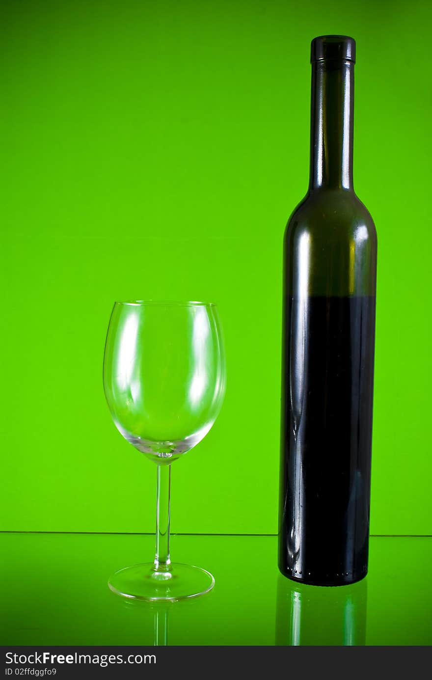 Wine glass on green background