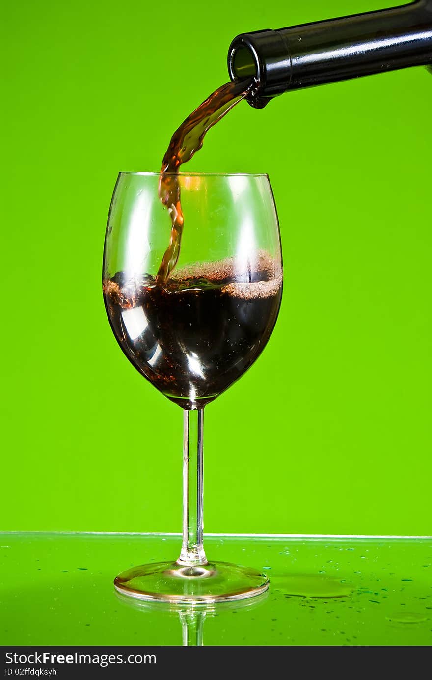 Red wine poured into glass