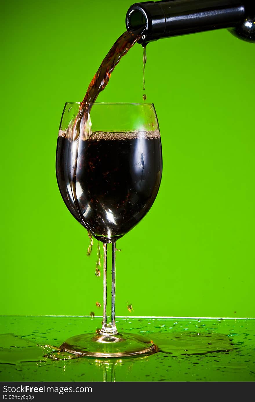 Red wine poured into glass