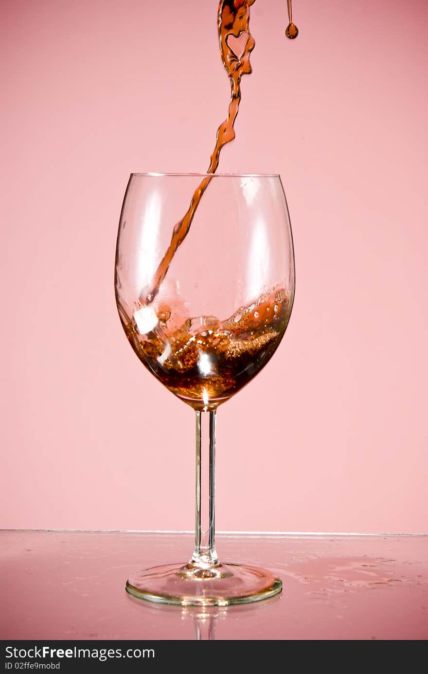 Red wine poured into glass