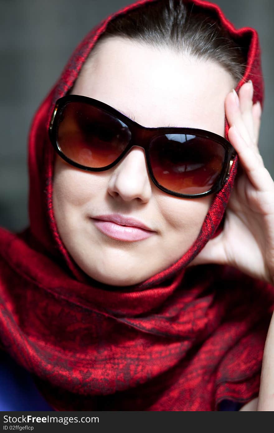 Young girl in a red shawl