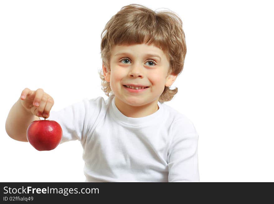 Little beautiful child playing and eating an apple - isolated on white. Little beautiful child playing and eating an apple - isolated on white