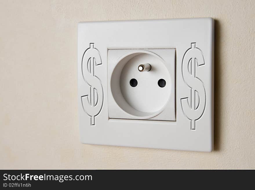 Close-up of white electric socket with dollar symbol. Close-up of white electric socket with dollar symbol