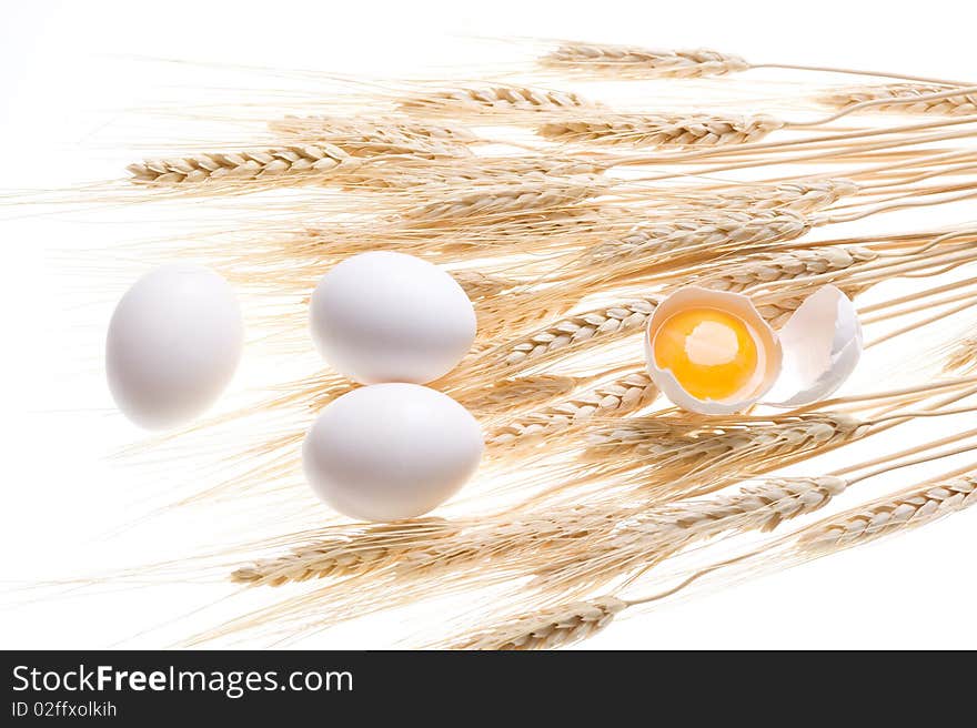 Background with gold wheat and egg