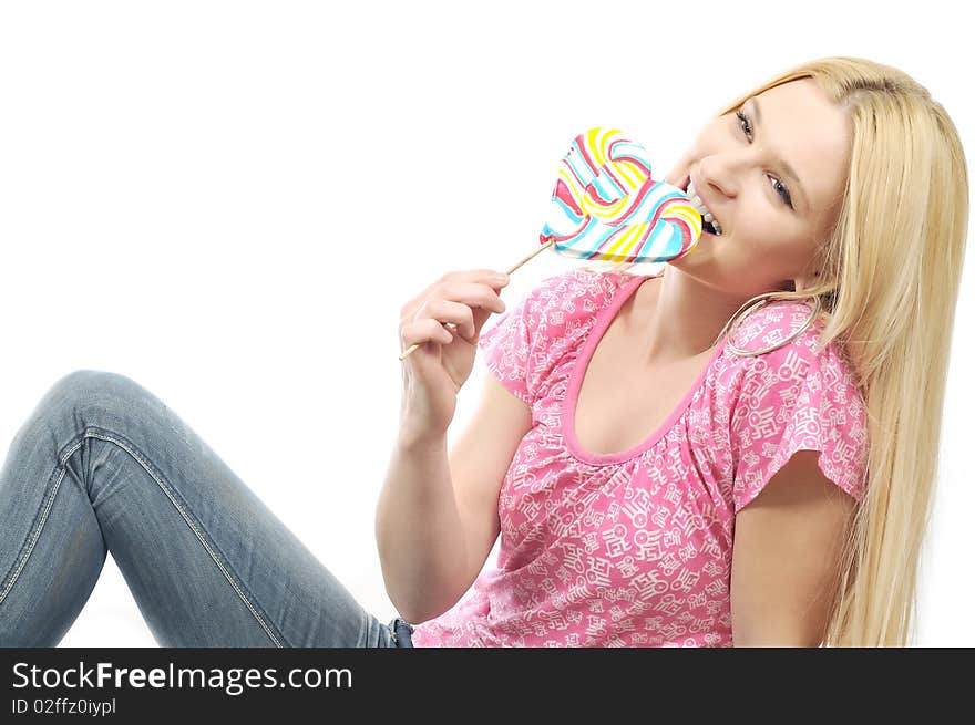 Blodie girl enjoying eating lollipop. Blodie girl enjoying eating lollipop