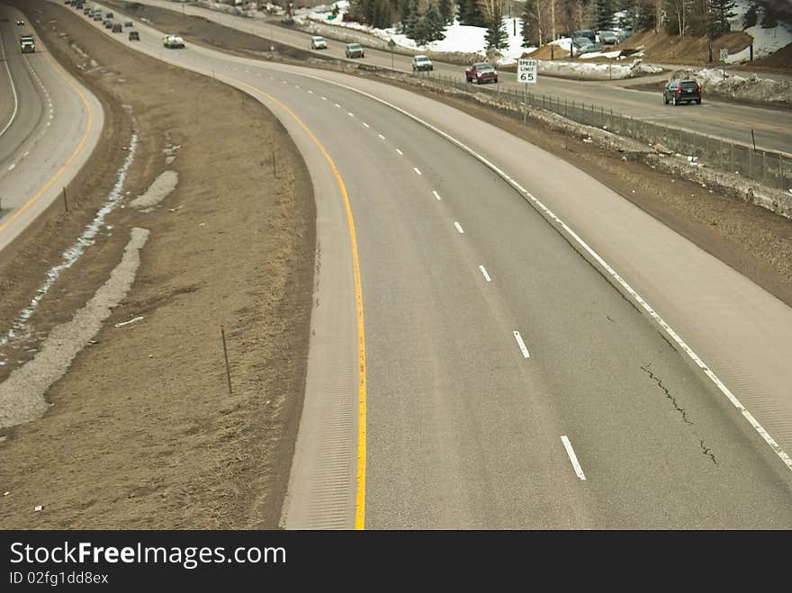 Partially empty freeway seen from above in vail, colorado. Partially empty freeway seen from above in vail, colorado