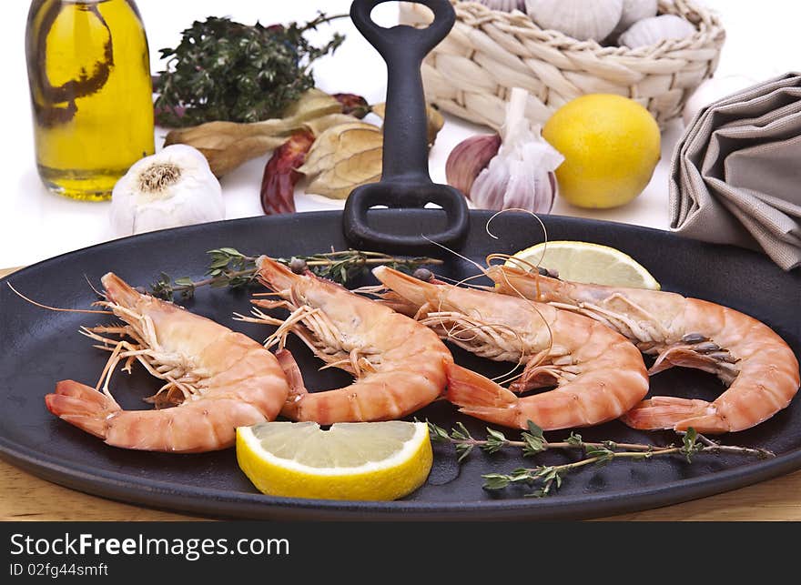 Tiger prawns on grill in kitchen setting