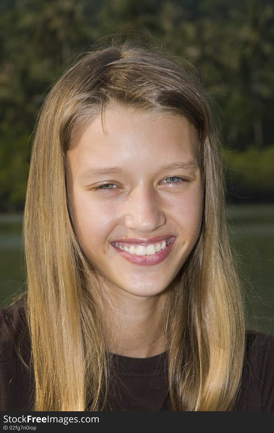 Closeup portrait of charming young girl smiling. Closeup portrait of charming young girl smiling