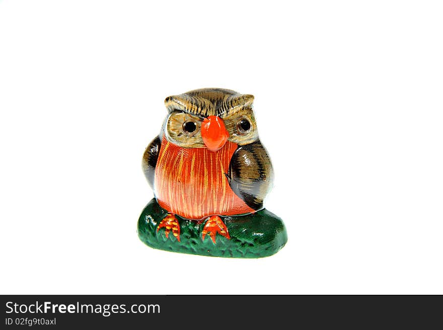 Isolated wooden brown owl trinket