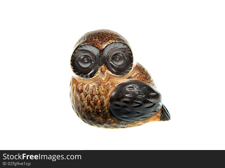 Isolated wooden brown owl trinket