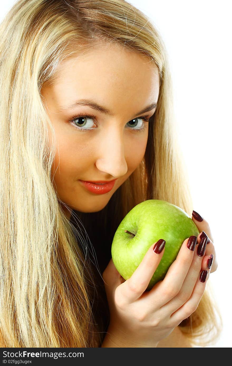 Pretty young woman with green apple.