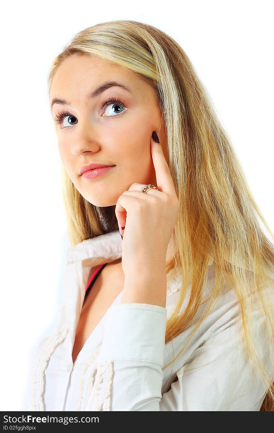 Beautiful young woman thinking on a white background