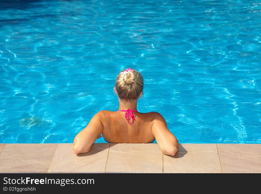 Woman Sitting In Pool