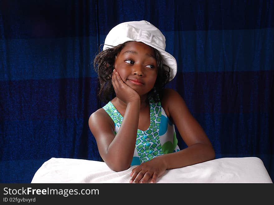 Young black child 6 years old posiing for a pageant contest. Young black child 6 years old posiing for a pageant contest