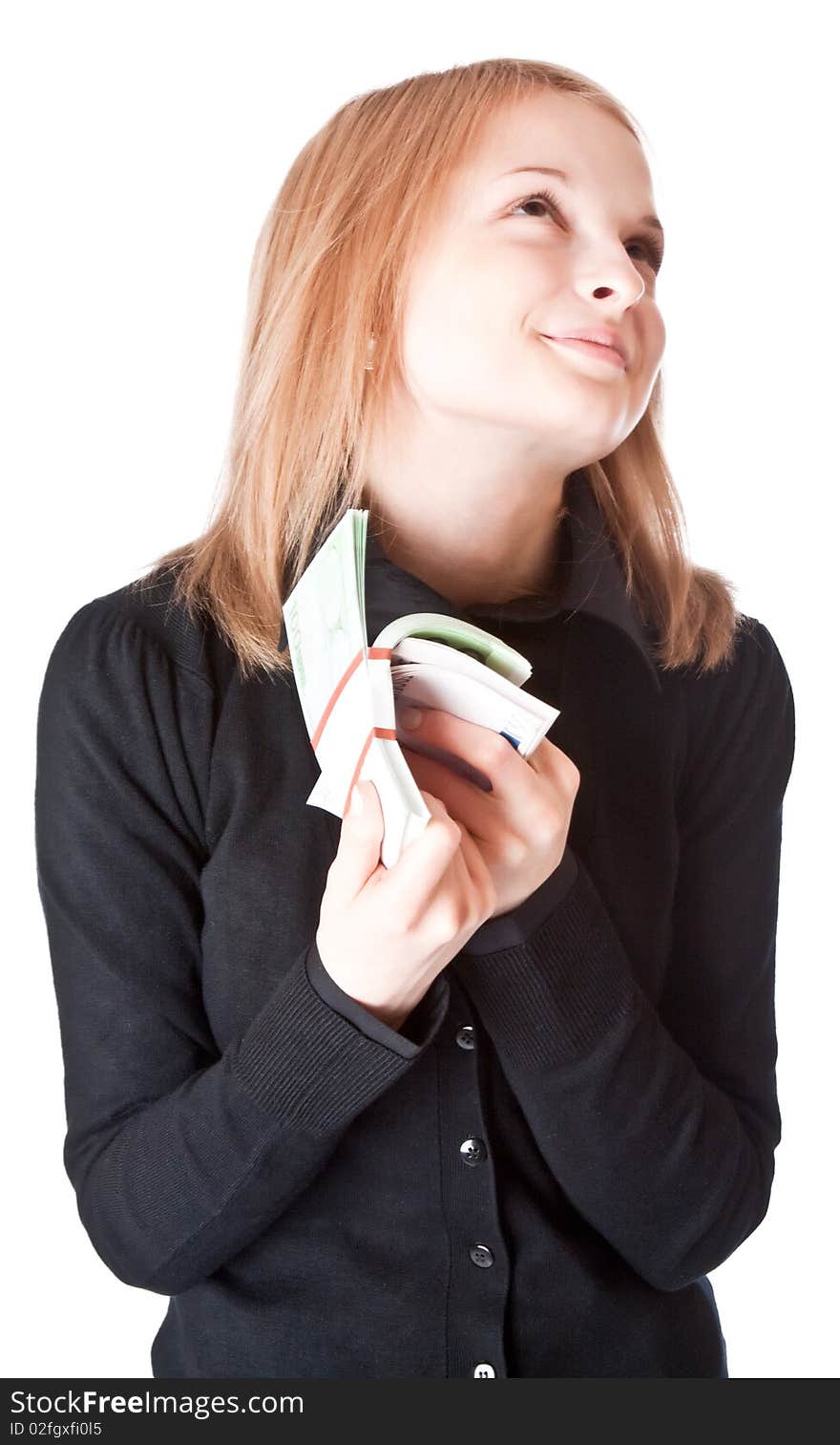 Beautiful girl with money. Isolated on white