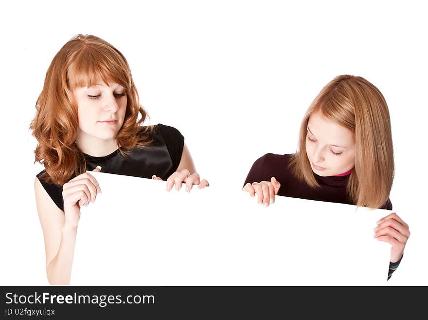 Two girls with white paper in hands