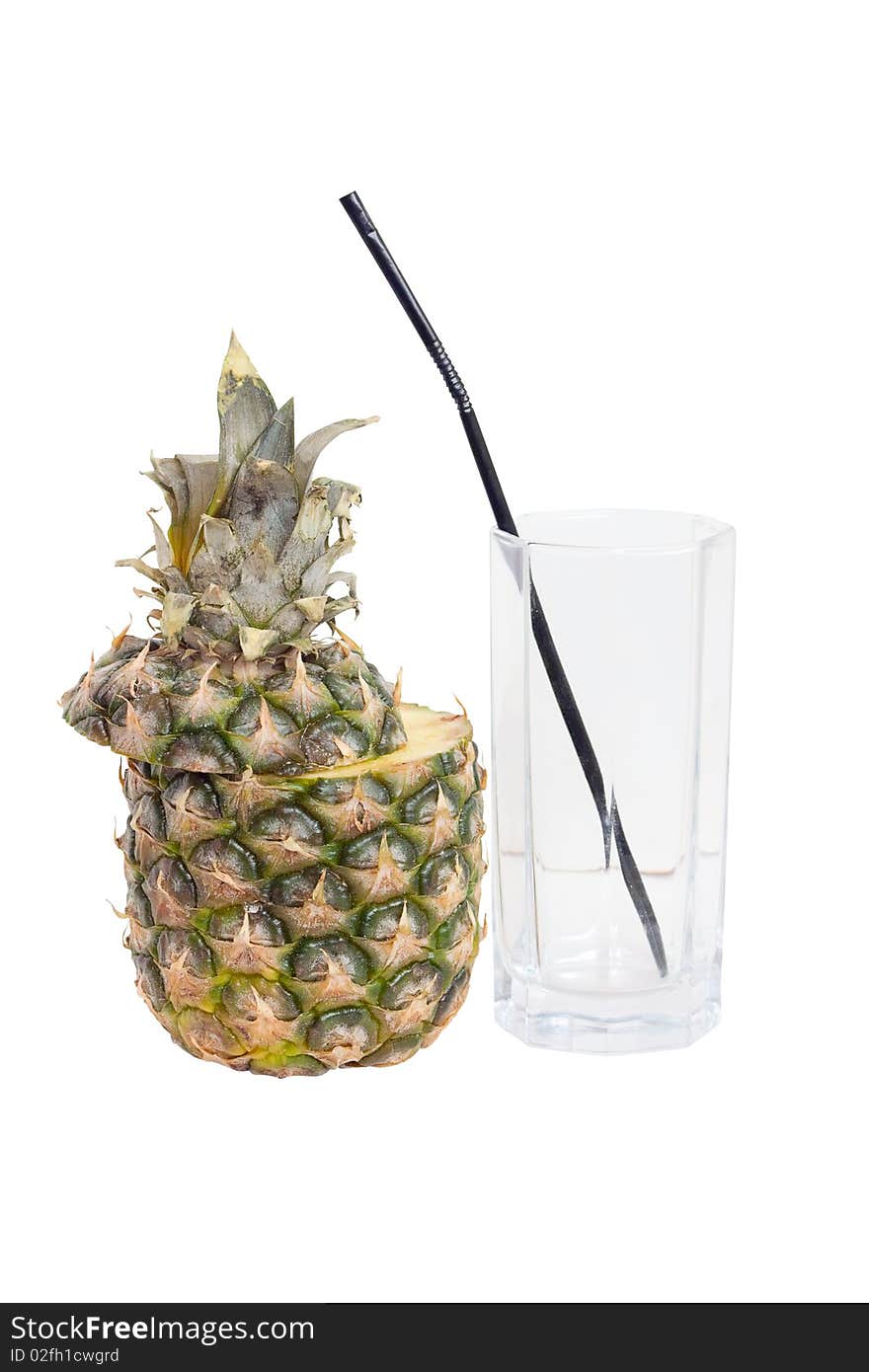 Sliced pineapple and an empty glass tube, isolated on a white background. Sliced pineapple and an empty glass tube, isolated on a white background.