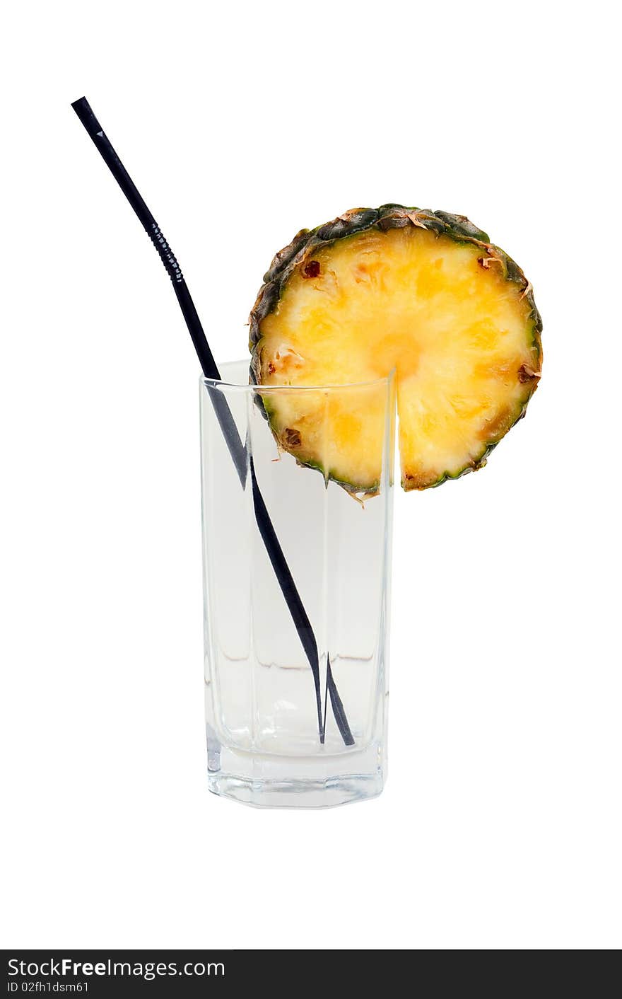 Empty glass with straw and a slice of pineapple, isolated on a white background. Empty glass with straw and a slice of pineapple, isolated on a white background.