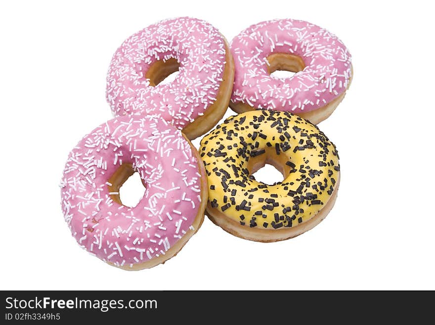 Four isolated doughnuts on white background