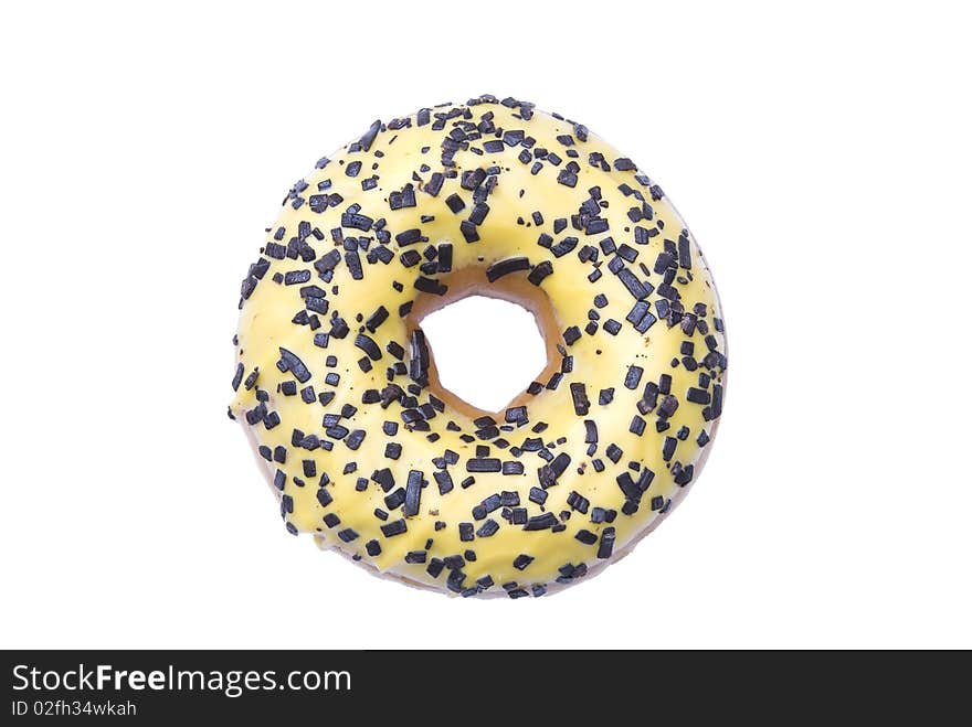 A single isolated doughnut on white background. A single isolated doughnut on white background