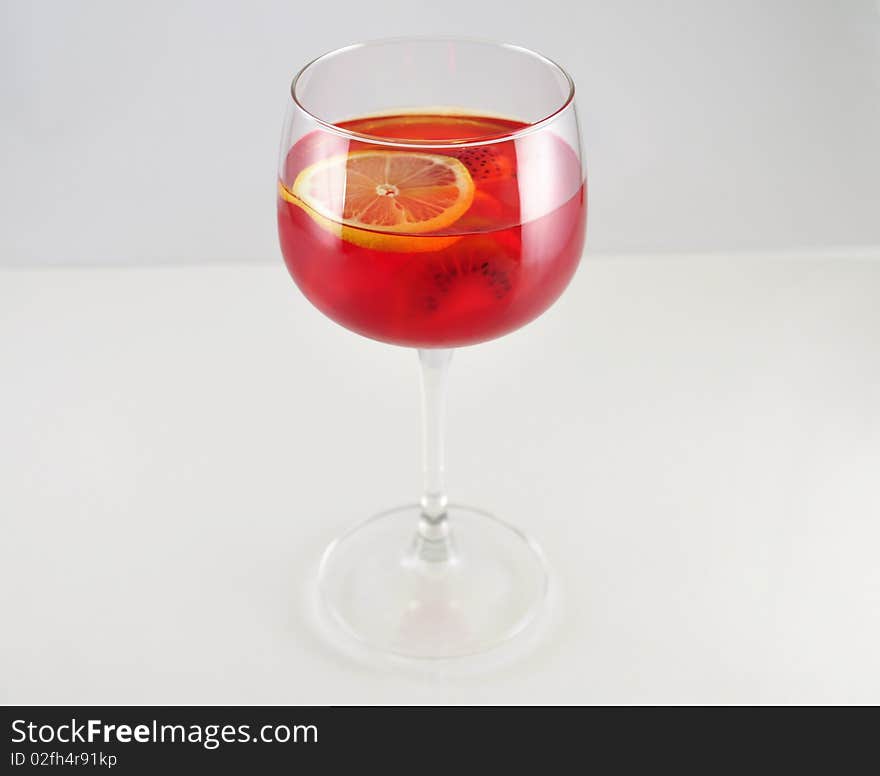 Strawberry jello with lemon in a glass