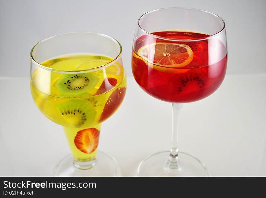 Fruit colored jello in a glass