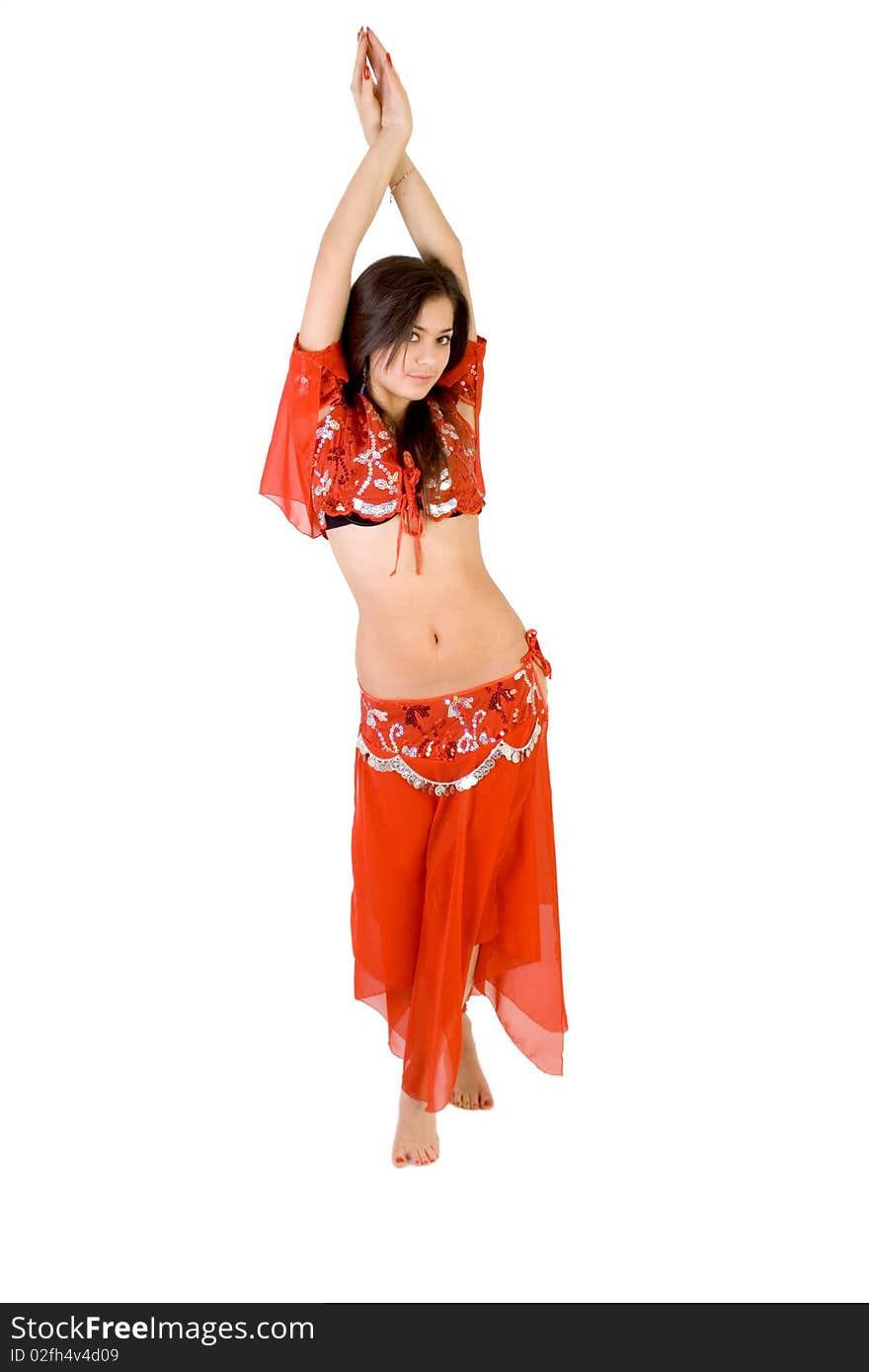 Pretty girl belly dancing in studio