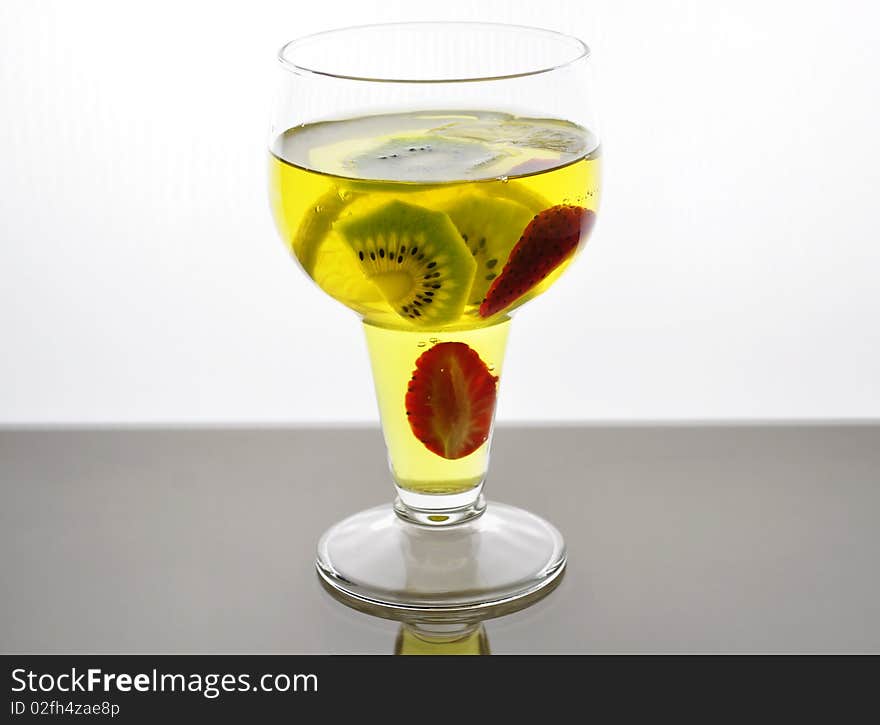 Fruit colored jello  in a glass