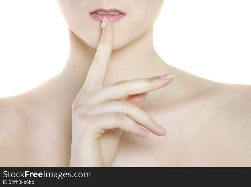 Attractive Woman With Finger At Her Lips