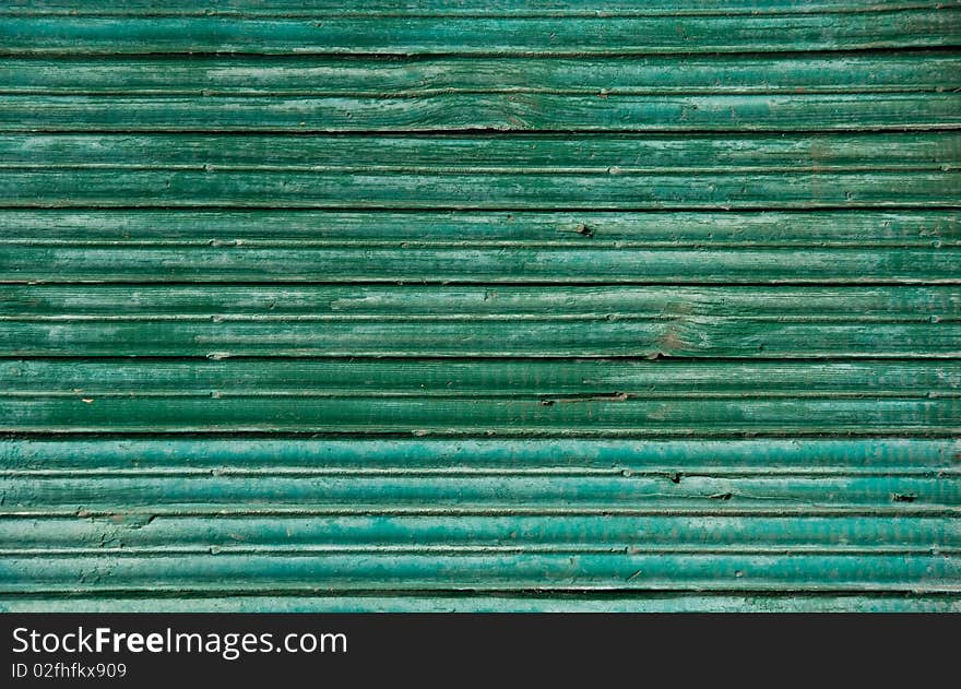 Background in a grunge style in the form of old wooden boards. Background in a grunge style in the form of old wooden boards