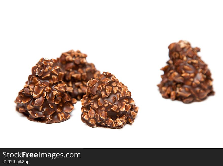 Mixed Chocolates heap against a white background. Mixed Chocolates heap against a white background