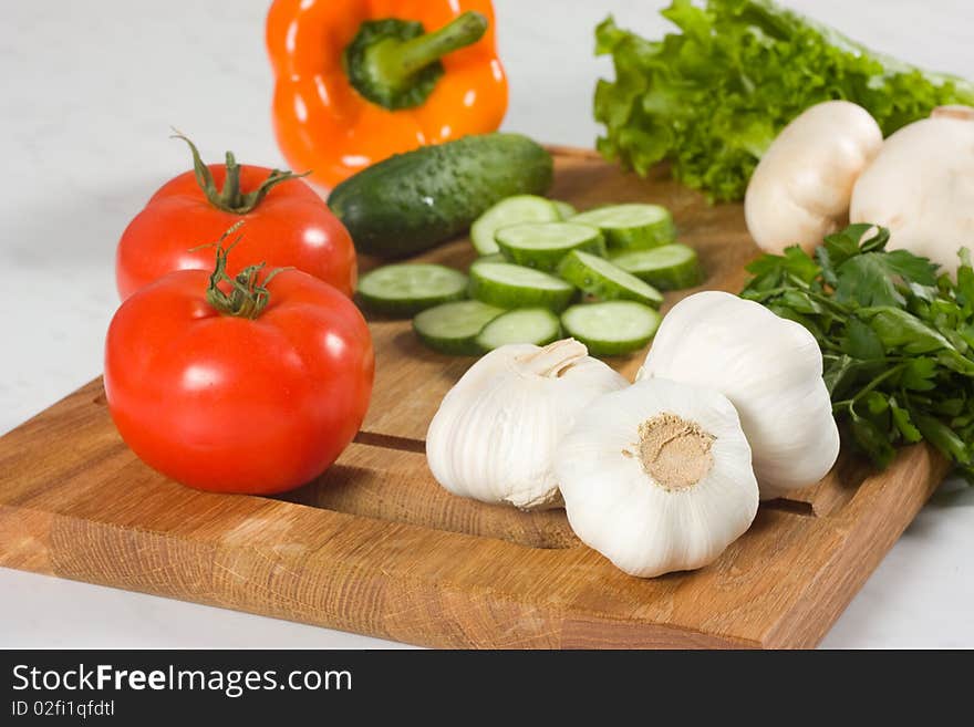 Fresh vegetables on cutting board