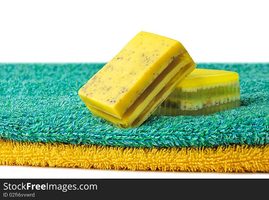 Pieces of handmade soap over white background