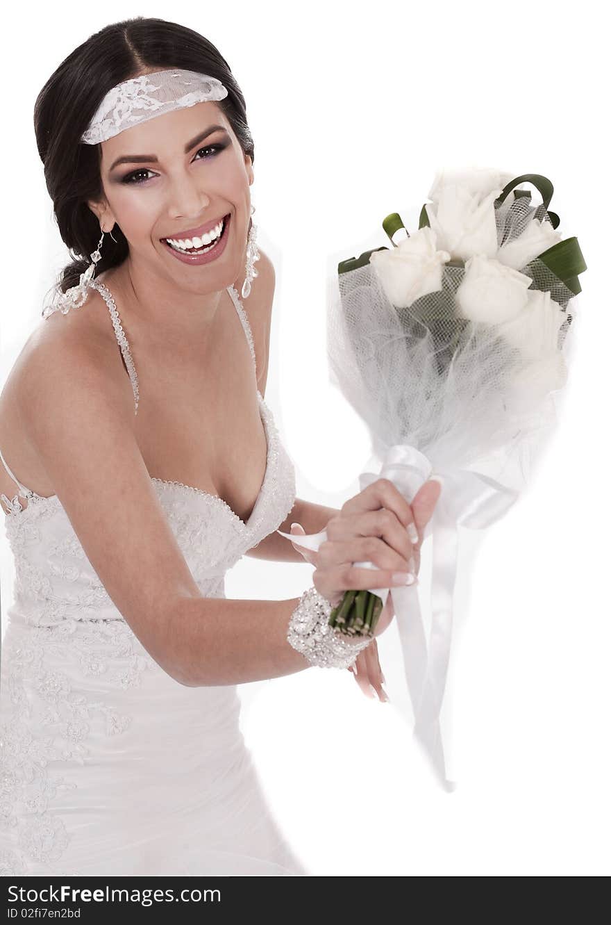 Bride throwing bouquet over white background. Bride throwing bouquet over white background