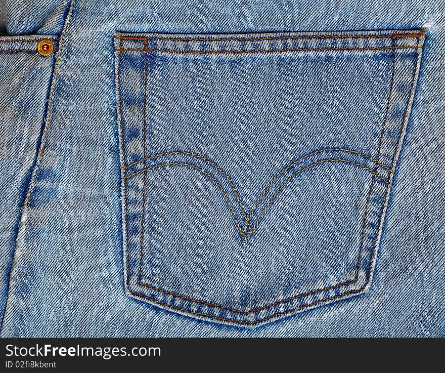 Blue denim jeans fabric with pocket. Blue denim jeans fabric with pocket.