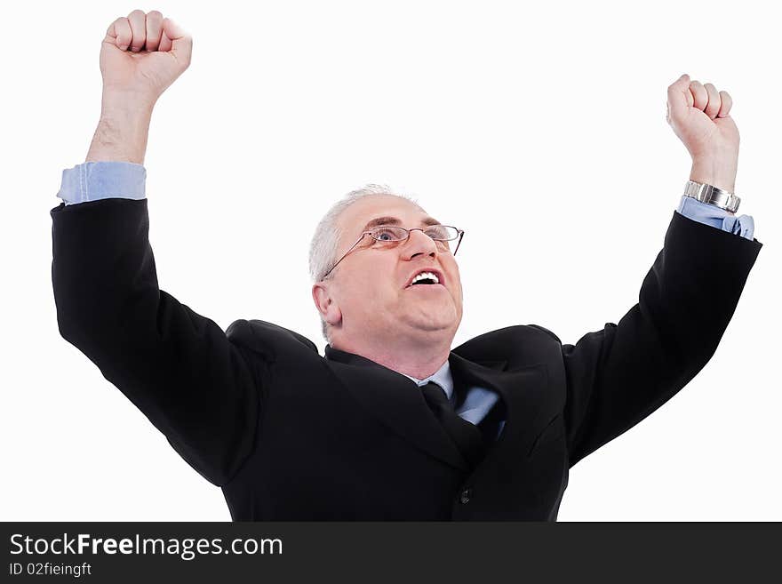 Champion senior business man standing with fists clenched in victory in white background