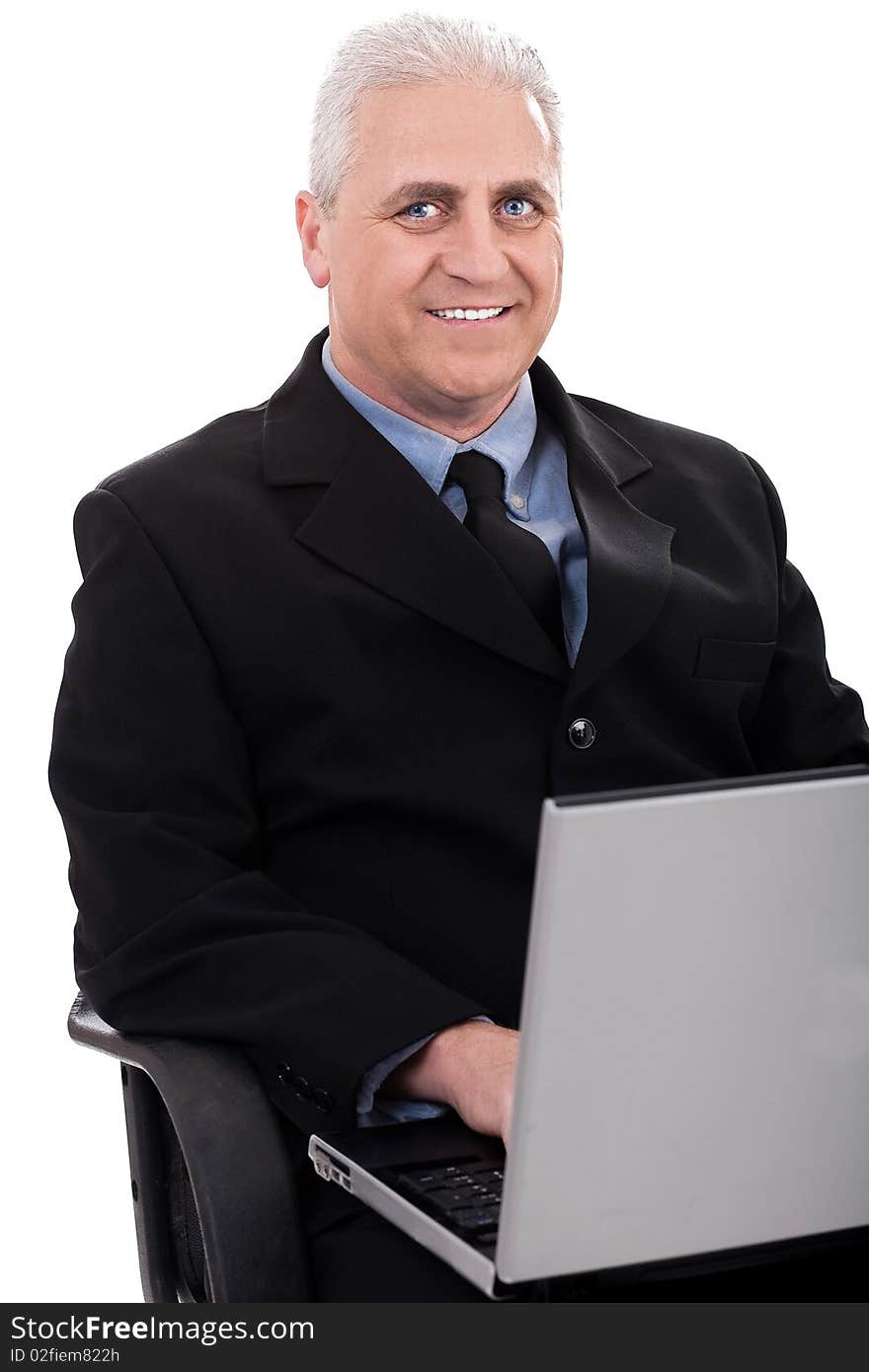 Mature business man working in notebook on white background