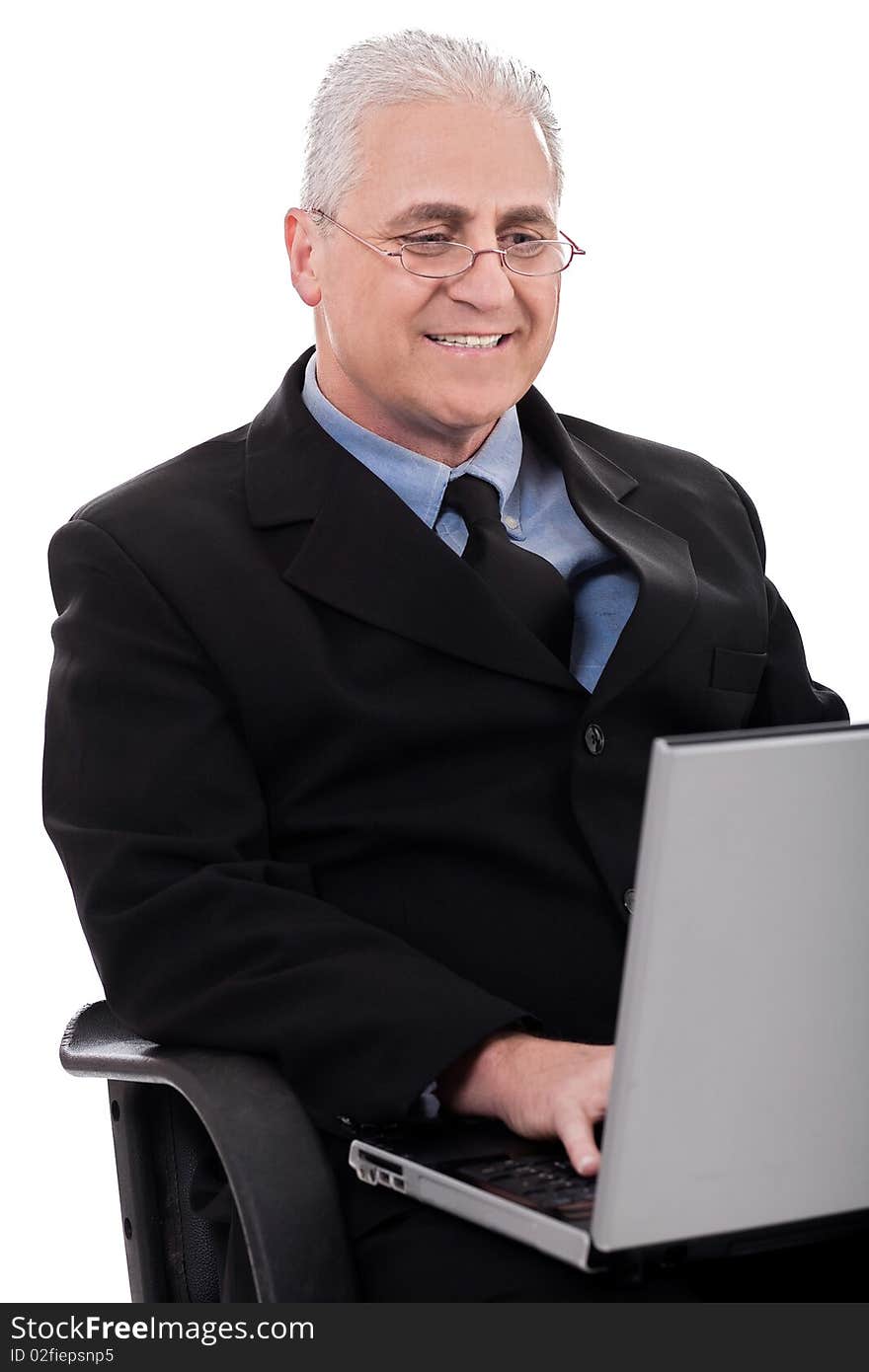 Mature business man in working with laptop on white background