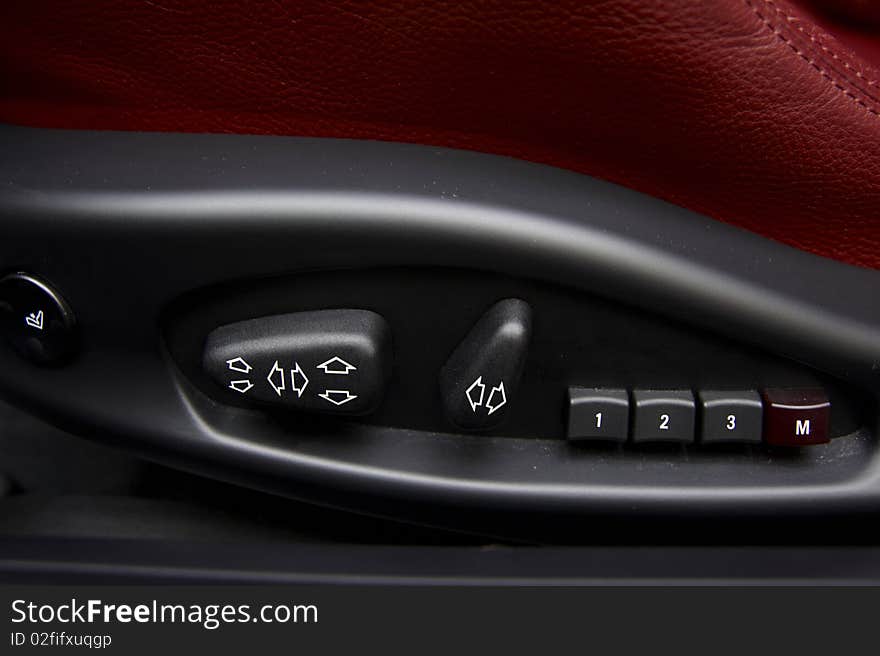 Detail of a car seat buttons