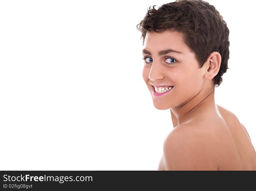 Topless young teenager smiling on white background